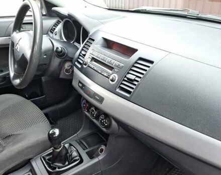 Сірий Міцубісі Lancer, об'ємом двигуна 1.5 л та пробігом 263 тис. км за 5200 $, фото 4 на Automoto.ua