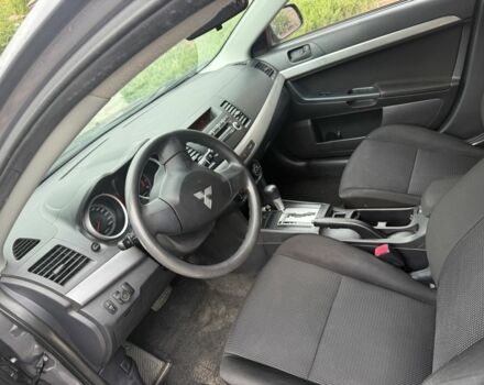 Сірий Міцубісі Lancer, об'ємом двигуна 1.5 л та пробігом 147 тис. км за 6700 $, фото 9 на Automoto.ua