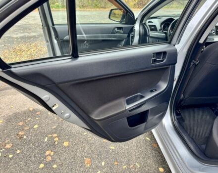 Серый Мицубиси Лансер, объемом двигателя 2 л и пробегом 225 тыс. км за 6890 $, фото 12 на Automoto.ua