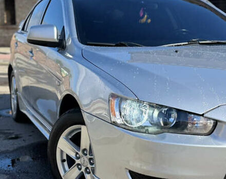 Серый Мицубиси Лансер, объемом двигателя 2 л и пробегом 190 тыс. км за 6900 $, фото 4 на Automoto.ua