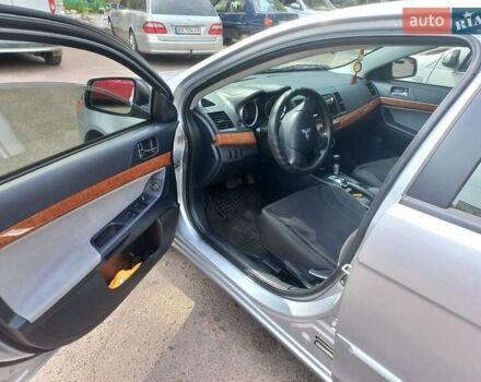 Серый Мицубиси Лансер, объемом двигателя 2 л и пробегом 103 тыс. км за 7700 $, фото 13 на Automoto.ua