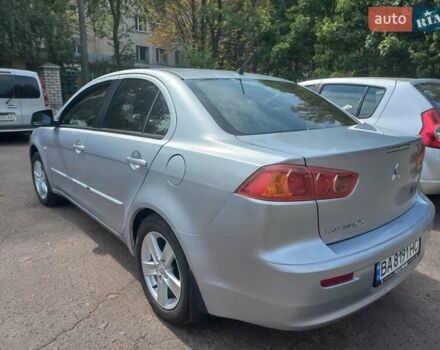 Серый Мицубиси Лансер, объемом двигателя 2 л и пробегом 103 тыс. км за 7700 $, фото 6 на Automoto.ua