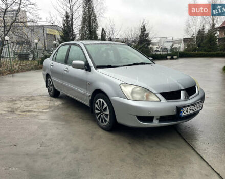 Сірий Міцубісі Lancer, об'ємом двигуна 1.58 л та пробігом 220 тис. км за 5900 $, фото 1 на Automoto.ua