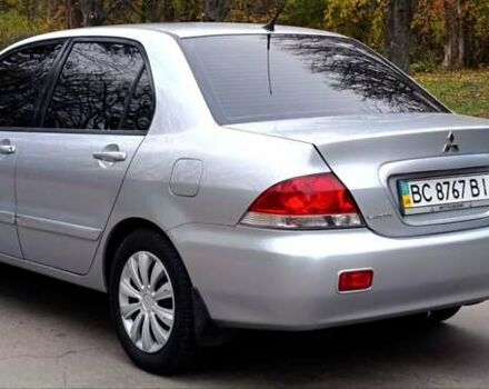 Серый Мицубиси Лансер, объемом двигателя 1.58 л и пробегом 176 тыс. км за 5000 $, фото 6 на Automoto.ua