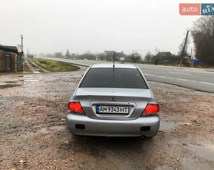 Серый Мицубиси Лансер, объемом двигателя 1.58 л и пробегом 268 тыс. км за 3450 $, фото 2 на Automoto.ua
