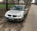 Серый Мицубиси Лансер, объемом двигателя 1.3 л и пробегом 127 тыс. км за 5900 $, фото 1 на Automoto.ua
