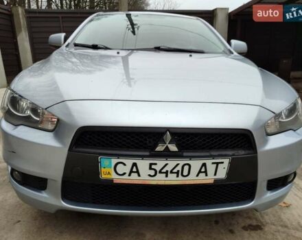Серый Мицубиси Лансер, объемом двигателя 2 л и пробегом 234 тыс. км за 7200 $, фото 6 на Automoto.ua