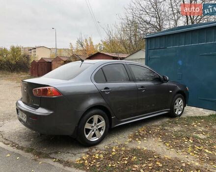 Сірий Міцубісі Lancer, об'ємом двигуна 2 л та пробігом 187 тис. км за 8000 $, фото 9 на Automoto.ua
