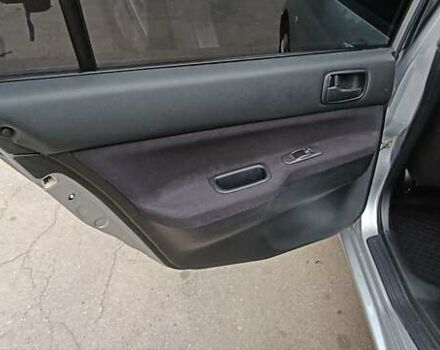 Серый Мицубиси Лансер, объемом двигателя 1.58 л и пробегом 176 тыс. км за 5000 $, фото 22 на Automoto.ua