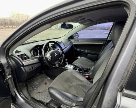 Серый Мицубиси Лансер, объемом двигателя 2 л и пробегом 203 тыс. км за 4999 $, фото 17 на Automoto.ua