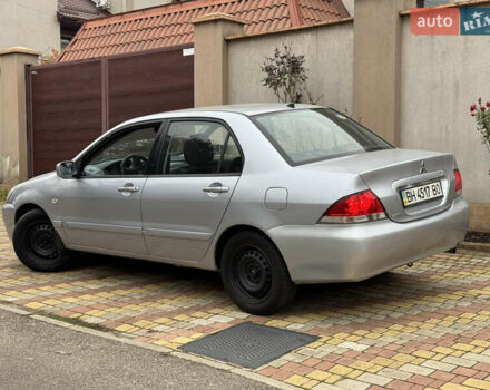 Сірий Міцубісі Lancer, об'ємом двигуна 1.6 л та пробігом 221 тис. км за 3650 $, фото 7 на Automoto.ua