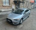 Серый Мицубиси Лансер, объемом двигателя 2 л и пробегом 193 тыс. км за 6950 $, фото 1 на Automoto.ua
