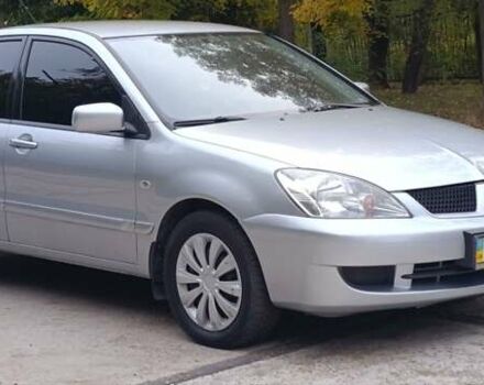 Сірий Міцубісі Lancer, об'ємом двигуна 1.6 л та пробігом 176 тис. км за 4999 $, фото 5 на Automoto.ua