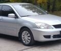 Сірий Міцубісі Lancer, об'ємом двигуна 1.6 л та пробігом 176 тис. км за 4999 $, фото 5 на Automoto.ua