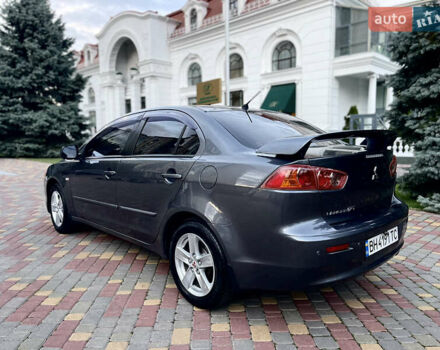 Серый Мицубиси Лансер, объемом двигателя 2 л и пробегом 212 тыс. км за 6000 $, фото 6 на Automoto.ua