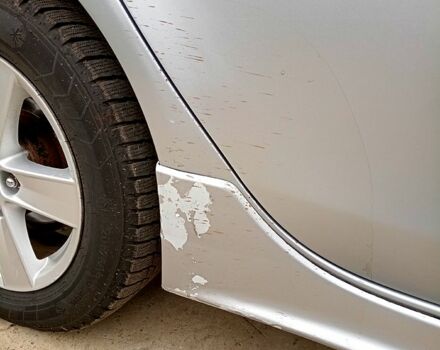 Серый Мицубиси Лансер, объемом двигателя 2 л и пробегом 243 тыс. км за 5500 $, фото 8 на Automoto.ua