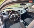 Сірий Міцубісі Lancer, об'ємом двигуна 2 л та пробігом 223 тис. км за 7390 $, фото 10 на Automoto.ua