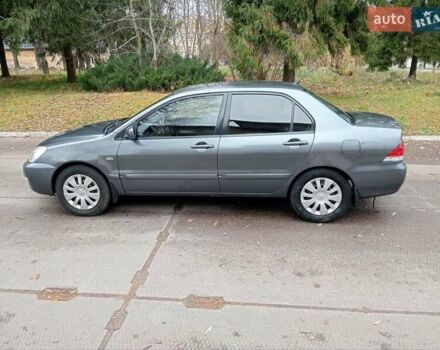 Серый Мицубиси Лансер, объемом двигателя 1.58 л и пробегом 205 тыс. км за 3300 $, фото 6 на Automoto.ua