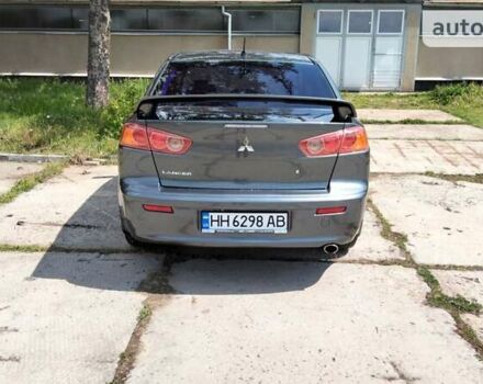 Сірий Міцубісі Lancer, об'ємом двигуна 2 л та пробігом 221 тис. км за 7100 $, фото 2 на Automoto.ua