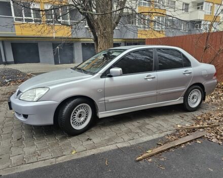 Серый Мицубиси Лансер, объемом двигателя 1.6 л и пробегом 290 тыс. км за 4800 $, фото 3 на Automoto.ua