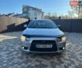 Серый Мицубиси Лансер, объемом двигателя 2 л и пробегом 257 тыс. км за 5600 $, фото 1 на Automoto.ua