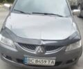 Сірий Міцубісі Lancer, об'ємом двигуна 1.58 л та пробігом 323 тис. км за 3300 $, фото 1 на Automoto.ua