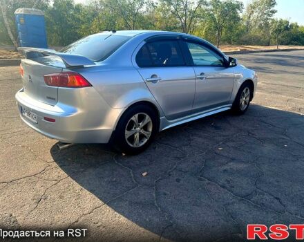 Серый Мицубиси Лансер, объемом двигателя 2 л и пробегом 151 тыс. км за 6099 $, фото 5 на Automoto.ua