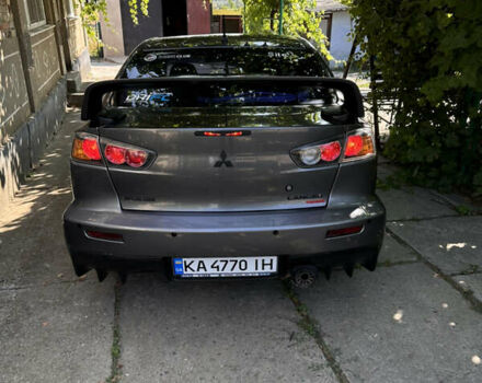Сірий Міцубісі Lancer, об'ємом двигуна 1.5 л та пробігом 255 тис. км за 8000 $, фото 7 на Automoto.ua