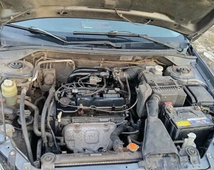 Серый Мицубиси Лансер, объемом двигателя 1.6 л и пробегом 234 тыс. км за 4300 $, фото 6 на Automoto.ua