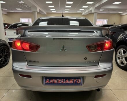Серый Мицубиси Лансер, объемом двигателя 2 л и пробегом 172 тыс. км за 6300 $, фото 6 на Automoto.ua