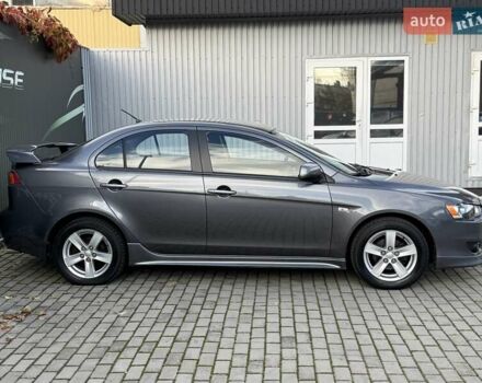 Серый Мицубиси Лансер, объемом двигателя 2 л и пробегом 230 тыс. км за 6900 $, фото 7 на Automoto.ua