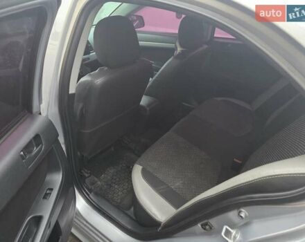 Серый Мицубиси Лансер, объемом двигателя 2 л и пробегом 175 тыс. км за 6500 $, фото 3 на Automoto.ua