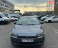 Серый Мицубиси Лансер, объемом двигателя 1.5 л и пробегом 300 тыс. км за 3800 $, фото 1 на Automoto.ua