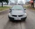 Серый Мицубиси Лансер, объемом двигателя 1.58 л и пробегом 205 тыс. км за 3300 $, фото 1 на Automoto.ua