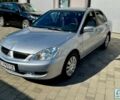 Сірий Міцубісі Lancer, об'ємом двигуна 1.6 л та пробігом 235 тис. км за 3550 $, фото 1 на Automoto.ua