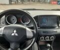 Сірий Міцубісі Lancer, об'ємом двигуна 1.5 л та пробігом 241 тис. км за 5950 $, фото 18 на Automoto.ua