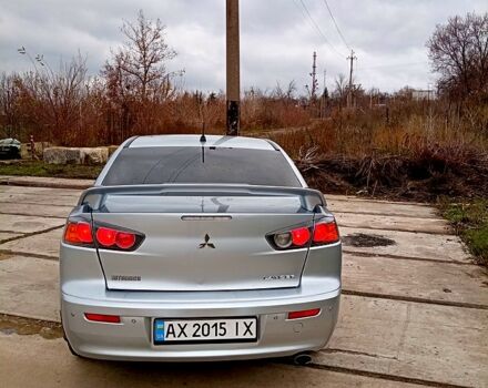 Серый Мицубиси Лансер, объемом двигателя 2 л и пробегом 243 тыс. км за 5500 $, фото 1 на Automoto.ua