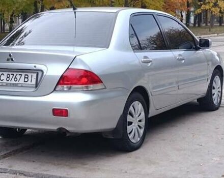 Сірий Міцубісі Lancer, об'ємом двигуна 1.6 л та пробігом 176 тис. км за 4999 $, фото 3 на Automoto.ua