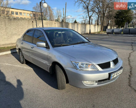 Серый Мицубиси Лансер, объемом двигателя 1.6 л и пробегом 193 тыс. км за 4000 $, фото 2 на Automoto.ua