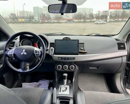 Серый Мицубиси Лансер, объемом двигателя 2 л и пробегом 203 тыс. км за 4999 $, фото 8 на Automoto.ua