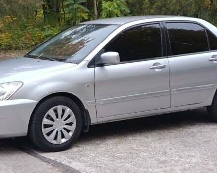 Сірий Міцубісі Lancer, об'ємом двигуна 1.6 л та пробігом 176 тис. км за 4999 $, фото 2 на Automoto.ua