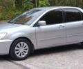 Сірий Міцубісі Lancer, об'ємом двигуна 1.6 л та пробігом 176 тис. км за 4999 $, фото 2 на Automoto.ua