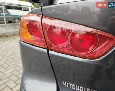 Міцубісі Lancer 2008 у Хмельницькому на Automoto.ua Сірий Міцубісі Lancer, об'ємом двигуна 2 л та пробігом 157 тис. км за 6300 $, фото 45 на Automoto.ua