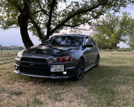 Серый Мицубиси Лансер, объемом двигателя 1.5 л и пробегом 255 тыс. км за 6000 $, фото 2 на Automoto.ua