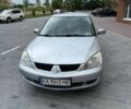 Сірий Міцубісі Lancer, об'ємом двигуна 1.6 л та пробігом 131 тис. км за 4300 $, фото 1 на Automoto.ua
