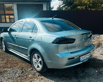 Сірий Міцубісі Lancer, об'ємом двигуна 2 л та пробігом 212 тис. км за 7300 $, фото 9 на Automoto.ua