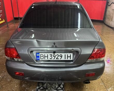 Серый Мицубиси Лансер, объемом двигателя 1.6 л и пробегом 268 тыс. км за 4600 $, фото 4 на Automoto.ua