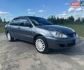 Сірий Міцубісі Lancer, об'ємом двигуна 1.58 л та пробігом 191 тис. км за 2750 $, фото 1 на Automoto.ua