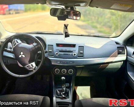 Серый Мицубиси Лансер, объемом двигателя 2 л и пробегом 250 тыс. км за 5800 $, фото 4 на Automoto.ua