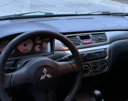 Сірий Міцубісі Lancer, об'ємом двигуна 1.58 л та пробігом 180 тис. км за 3900 $, фото 5 на Automoto.ua